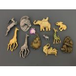 Ten Jonette Jewelry Company safari animal pin brooches, with two pin badges, including elephants,