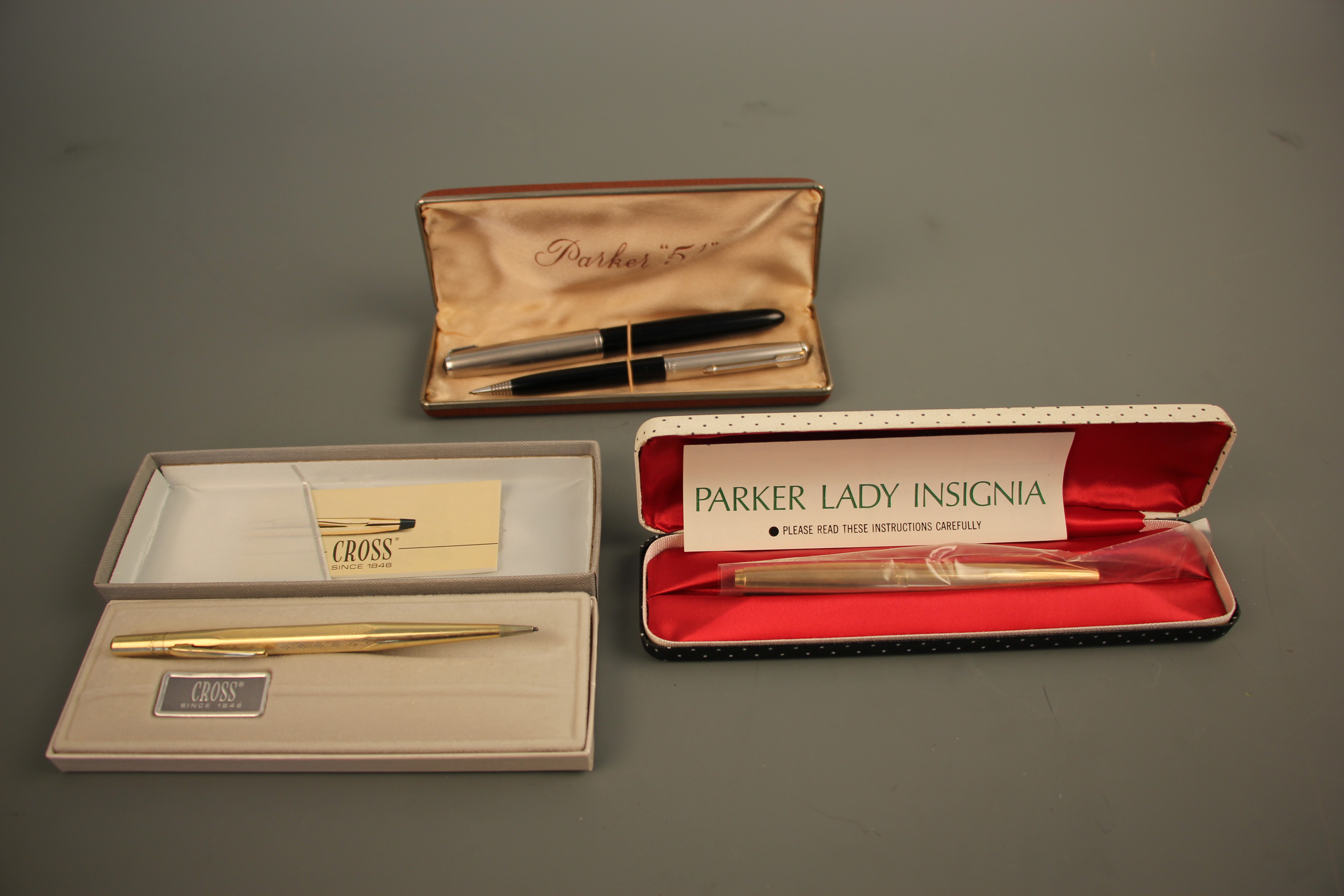 A Parker pen in box, a Parker '51' set comprising of a fountain pen, ball point pen in box, a '