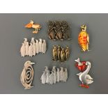 Ten Jonette Jewelry bird pin brooches, including six penguins and two pelicans. IMPORTANT: Online