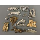 Ten Jonette Jewelry Company safari animal pin brooches, with two pin badges, including tigers,