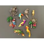 Nine Jonette Jewelry bird pin brooches, including parrots, pelican and flamingo. IMPORTANT: Online