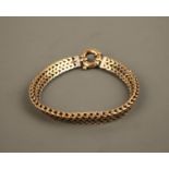 A mesh style link yellow and white 9ct gold bracelet, approx. length 20cms, approx. weight 39.