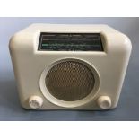 A Bush cream DAC 90A radio. IMPORTANT: Online viewing and bidding only. No in person collections, an