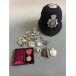 A collection of policeman’s items including Imperial Service medal belonging to Frederick Edward