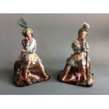 Scottish male and female hunter porcelain figurines with feathers in hats, height approx. 24cm.