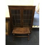 An oak two door display cabinet