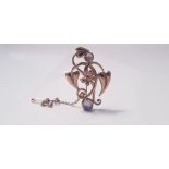 A 9ct yellow gold brooch of small butterfly, leaf and flower design, set with two moonstones,