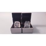 *Two EMPORIO ARMANI Gent's wrist watches, one with black face on black strap, one with black face,