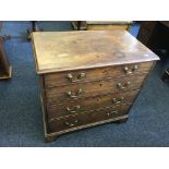 A small mahogany 19th century four drawer chest