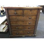 A Victorian mahogany chest of drawers with four long and two short drawers with bobbin turned