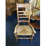 A 19th century rush seated rocking chair