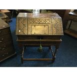 An 18th century oak sloping top bible box