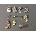 Five Jonette Jewelry saints and angels pin brooches with three badges and three bookmarks.