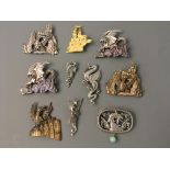 Eight Jonette Jewelry dragon pin brooches and two badges. IMPORTANT: Online viewing and bidding