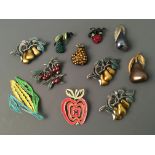 Eleven Jonette Jewelry fruit and vegetable pin brooches. IMPORTANT: Online viewing and bidding only.