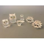 Four Swarovski various owls with two hedgehogs, four boxed. IMPORTANT: Online viewing and bidding