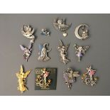 Eleven Jonette Jewelry fairy pin brooches and one badge. IMPORTANT: Online viewing and bidding only.