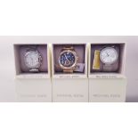 *Three Gent's Michael Kors wrist watches, one with black face, link bracelet strap, one with