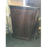 A 19th century oak wall mounted corner cupboard together with a swing mirror. IMPORTANT: Online