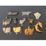 Eleven Jonette Jewelry cow pin brooches. IMPORTANT: Online viewing and bidding only. No in person
