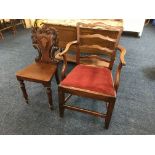An early 19th century mahogany carver dining chair