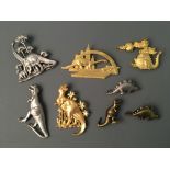 Eight Jonette Jewelry dinosaur and dragon pin brooches. IMPORTANT: Online viewing and bidding