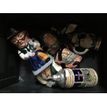 A box containing mixed items including various character jugs. IMPORTANT: Online viewing and bidding