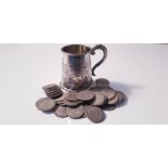 A tankard, inscribed with a nursery rhyme, approx. height 3" with a quantity of coins, some florins.
