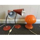 Two red angle lamps with an orange glass shade desk lamp. IMPORTANT: Online viewing and bidding