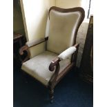 A 19th scrolled arm mahogany library chair