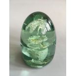 A Victorian green glass dump paperweight, height 10cm. IMPORTANT: Online viewing and bidding only.