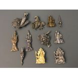 Nine Jonette Jewelry wizards and castles pin brooches and two badges. IMPORTANT: Online viewing