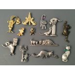 Eleven Jonette Jewelry cat pin brooches and one badge. IMPORTANT: Online viewing and bidding only.