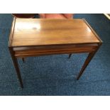 A teak single drawer hall table.