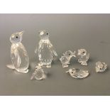 Three Swarovski penguins, together with four various ducks. IMPORTANT: Online viewing and bidding