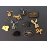 Eleven Jonette Jewelry pin brooches depicting moose, reindeer, hedgehogs, etc. IMPORTANT: Online