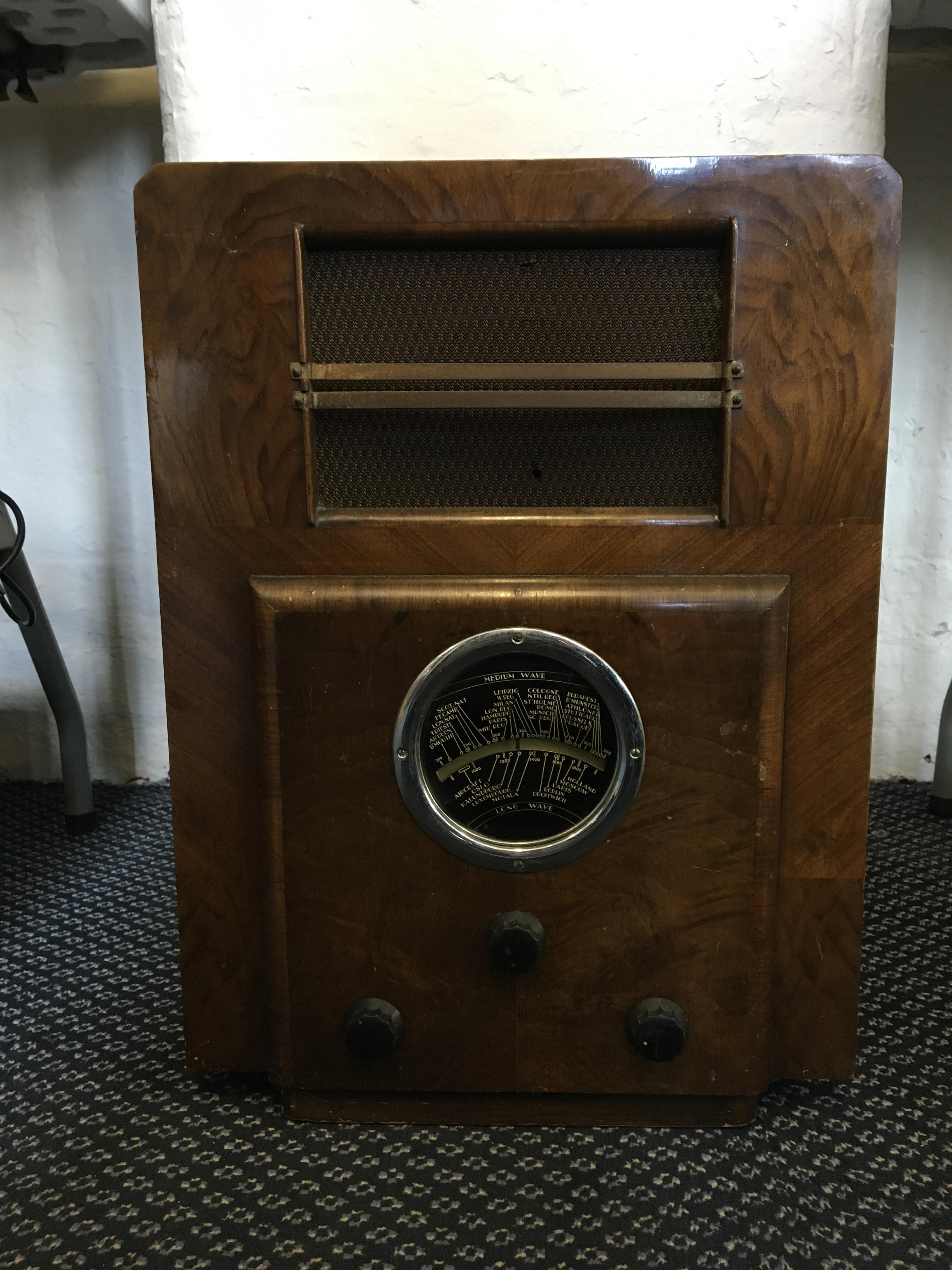 A Beethoven no. 99/2453 Art Deco walnut cased radio. IMPORTANT: Online viewing and bidding only.