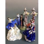 Five Royal Doulton figurines, two Top o the Hill in blue and red, The Graduate, My Love and