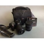 A Nikon D80 with EX Sigma lens, Sigma filter, case, charger, etc. IMPORTANT: Online viewing and