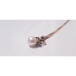 A drop pendant of a pearl and gem stone, bow design on a link chain, approx. length 18",approx.