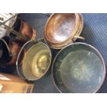 A jam kettle, two wooden bowls, weighing scales, two copper coal buckets and copper two handled pot.