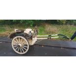 A horse drawn milk cart - restored in cream and brown livery Wilkin & Sons Ltd., Brook Hall Dairy,