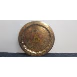 A large brass hand painted Indian style brass tray. IMPORTANT: Online viewing and bidding only.