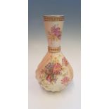 A Royal Worcester vase, model no. 1452, decorated with floral sprays and gilded bands to neck on