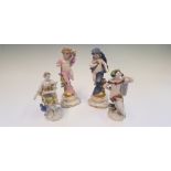 Four Meissen figurines including Greek gods, goddesses and putti, decorated with gold detail, all