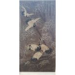 A large oriental embroidered picture of red headed cranes surrounded by bamboo in white painted