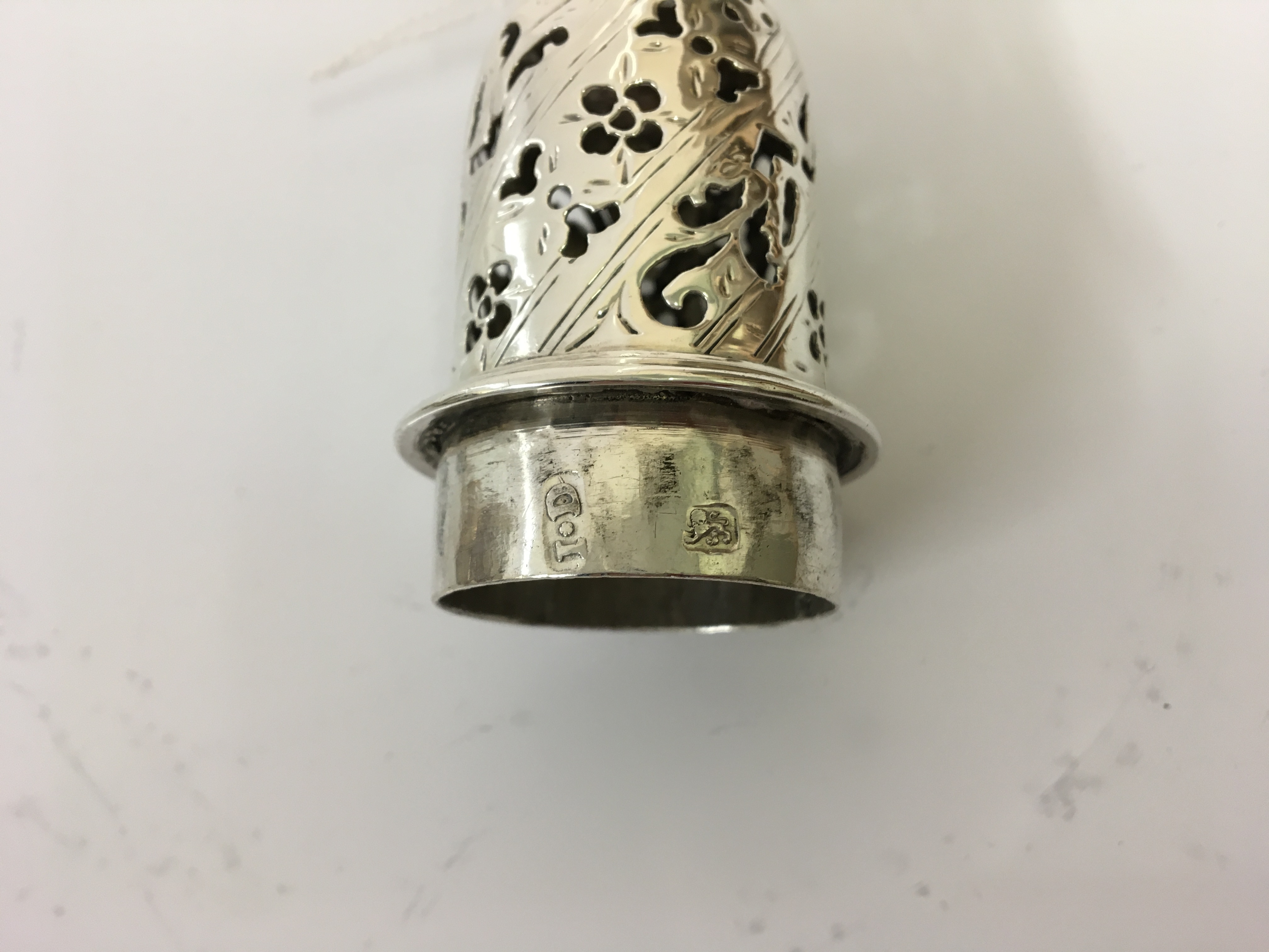 A George III silver pepper pot or small sugar caster with marks for London 1760