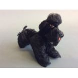 A Steiff black mohair poodle