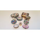 Nine hand painted enamel pill boxes