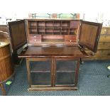 A 19th century mahogany secretaire desk with two glazed doors to base. IMPORTANT: Online viewing and